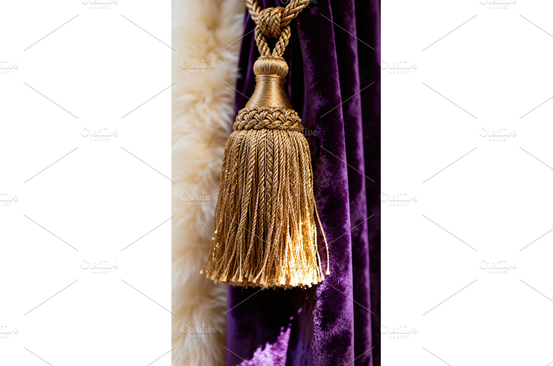Gold tassel hanging on purple velvet, an Arts & Entertainment Photo by tilialucida