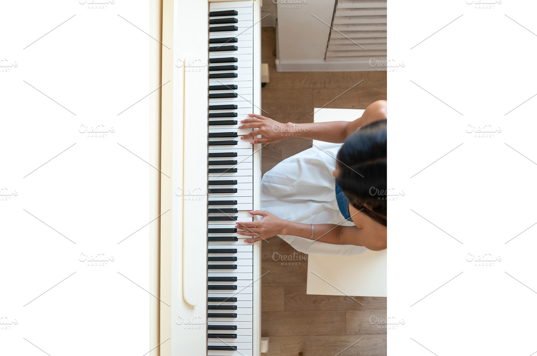 Woman playing the piano melodies, a School & Education Photo by undrey