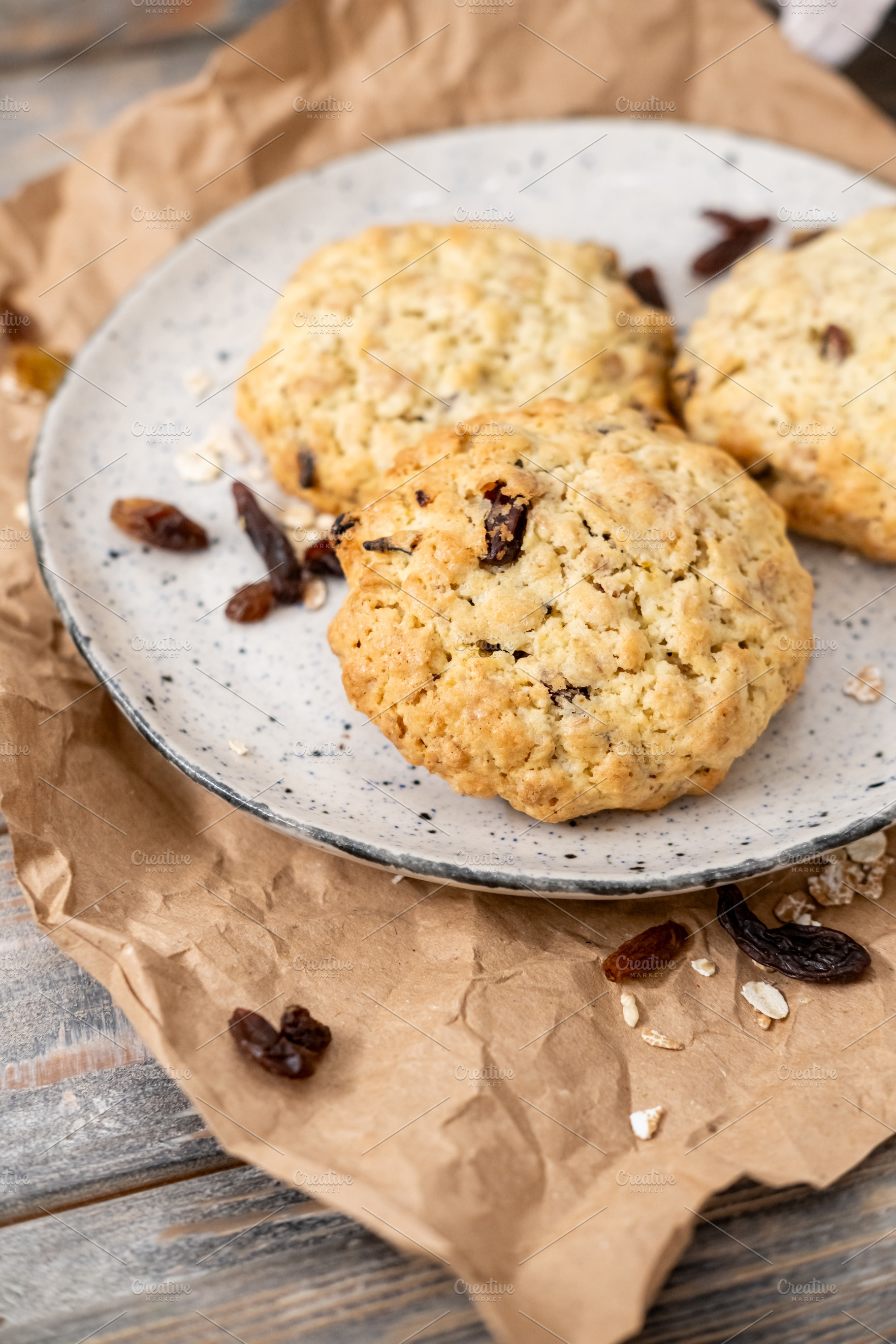 Homemade pastry crunchy biscuits raisins plate, a Food & Drink Photo by Photo Drive Studio