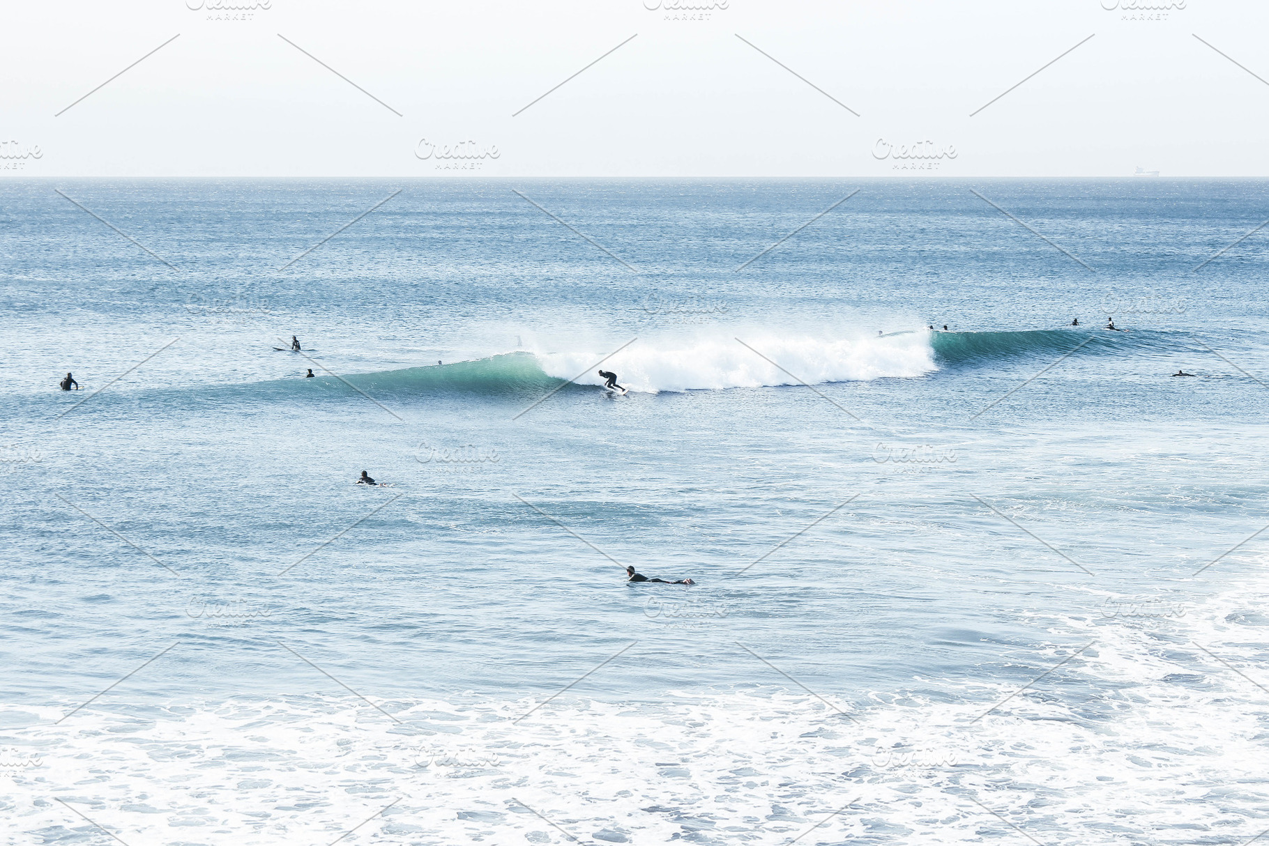 Ocean  surfers in california containing summer, sunny day, and surf, a Person Photo by tkristiina