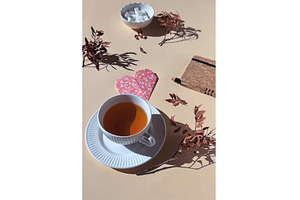Cup of tea with origami heart, sugar, a Photo by tilialucida