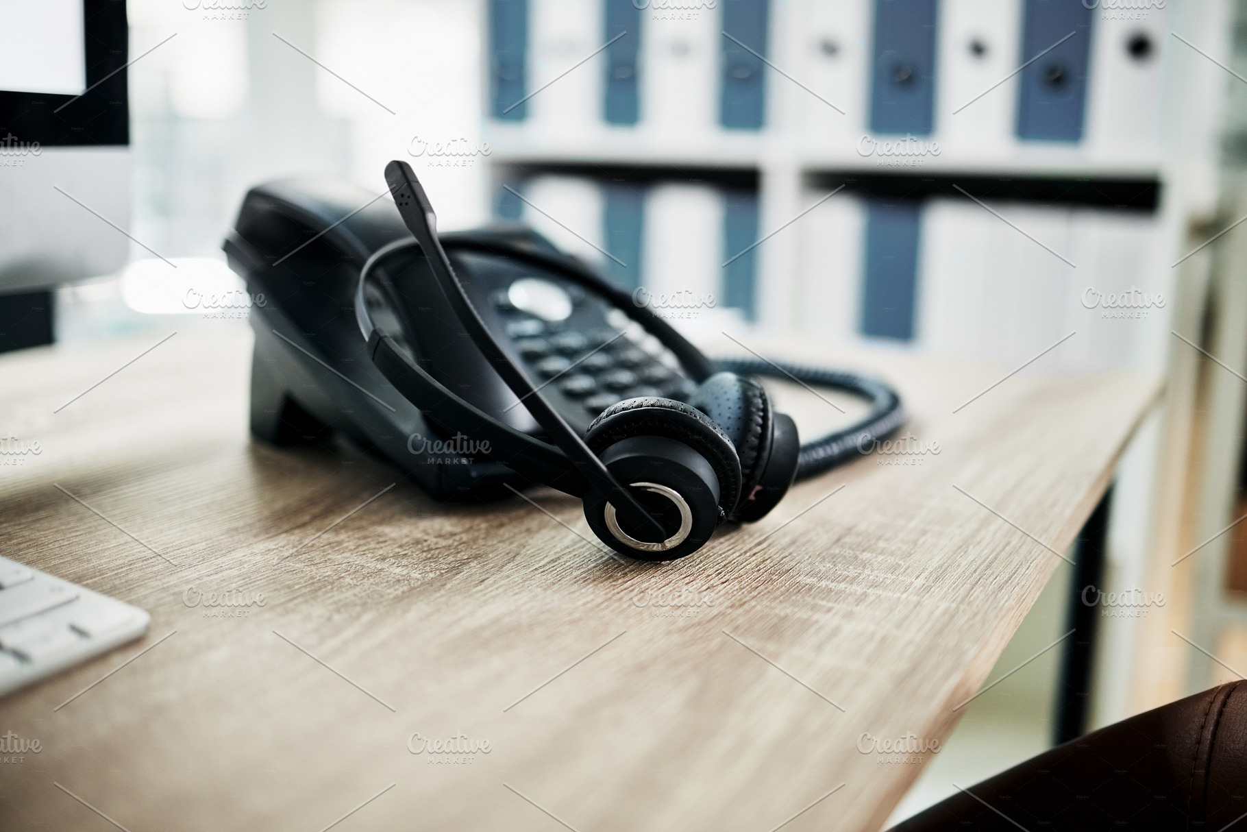 Telephone, contact us with call center, communication and headphone with microphone on work desk. Contact center, customer support and phone, consulting and customer service with callcenter voip., a Photo by Peopleimages.com