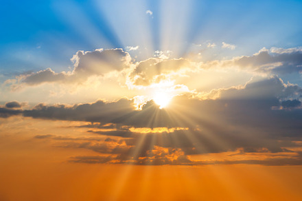 Sunset sky clouds with sun rays, a Nature Photo by Vapi