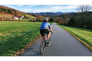 Cyclist rides on bike path with, a Sports & Recreation Photo by Lermont51