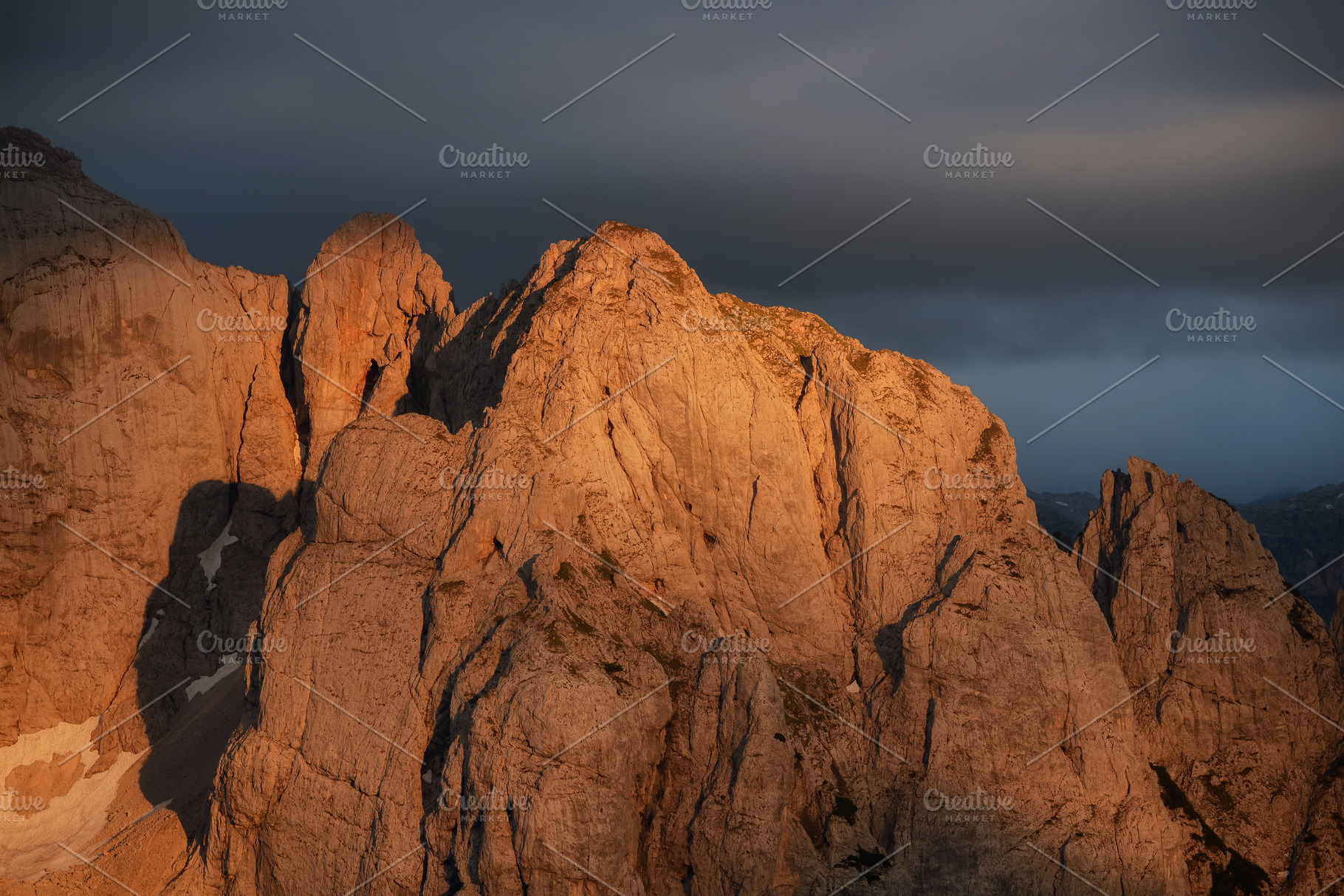 Sunset over the peaks of the mountai, a Nature Photo by Dreamy Pixel
