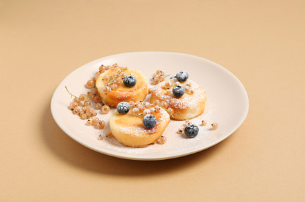 Concept of tasty sweet food, cheese pancakes, a Food & Drink Photo by AtlasStudio PRO