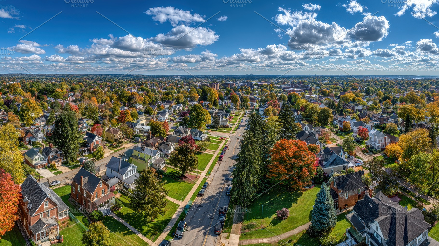 Aerial view of autumnal residential, a Photo by Pixeness Studio
