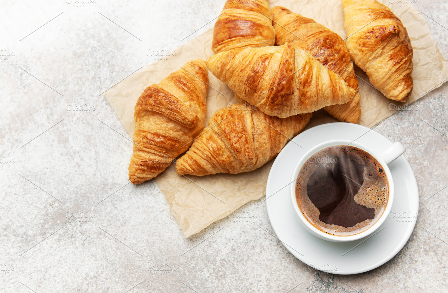 Freshly baked croissants and steaming cup of coffee creating per, a Food & Drink Photo by Olena Rudo