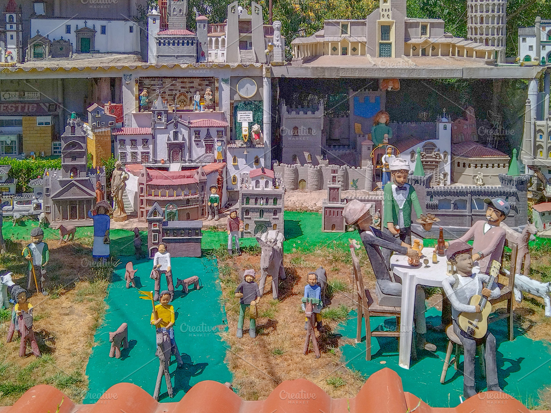 Detailed figurine scene from traditional miniature town, an Architecture Photo by DanFLCreativo