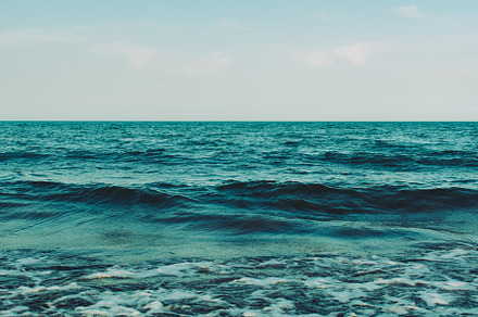 Blue sea beach stock photo containing blue and sea, a Nature Photo by Frostroomhead