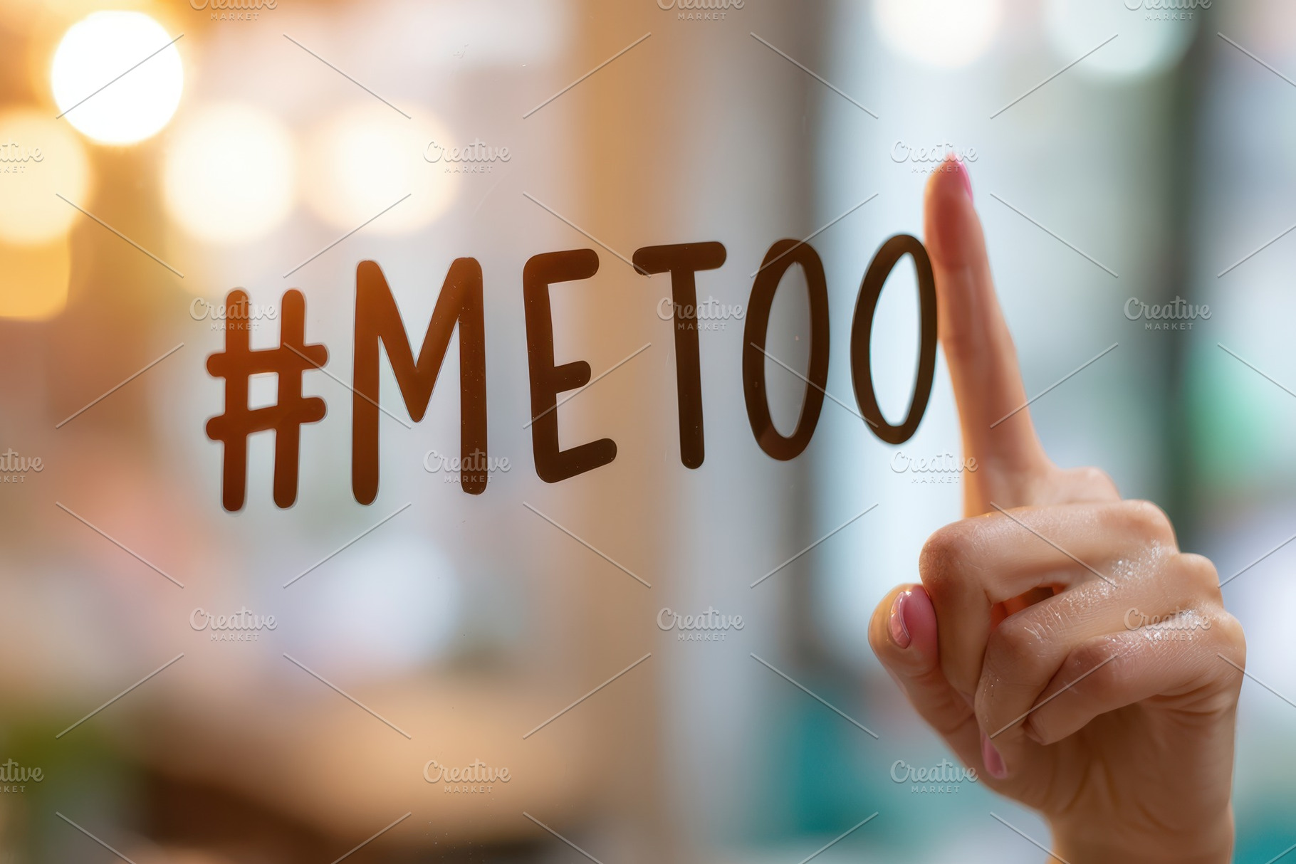 Metoo hashtag on glass with blurred lights, a Background Photo by AlyaAnd