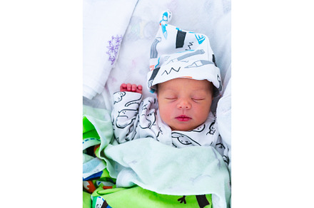 Smiling a newborn baby five days old containing baby, infant, and child