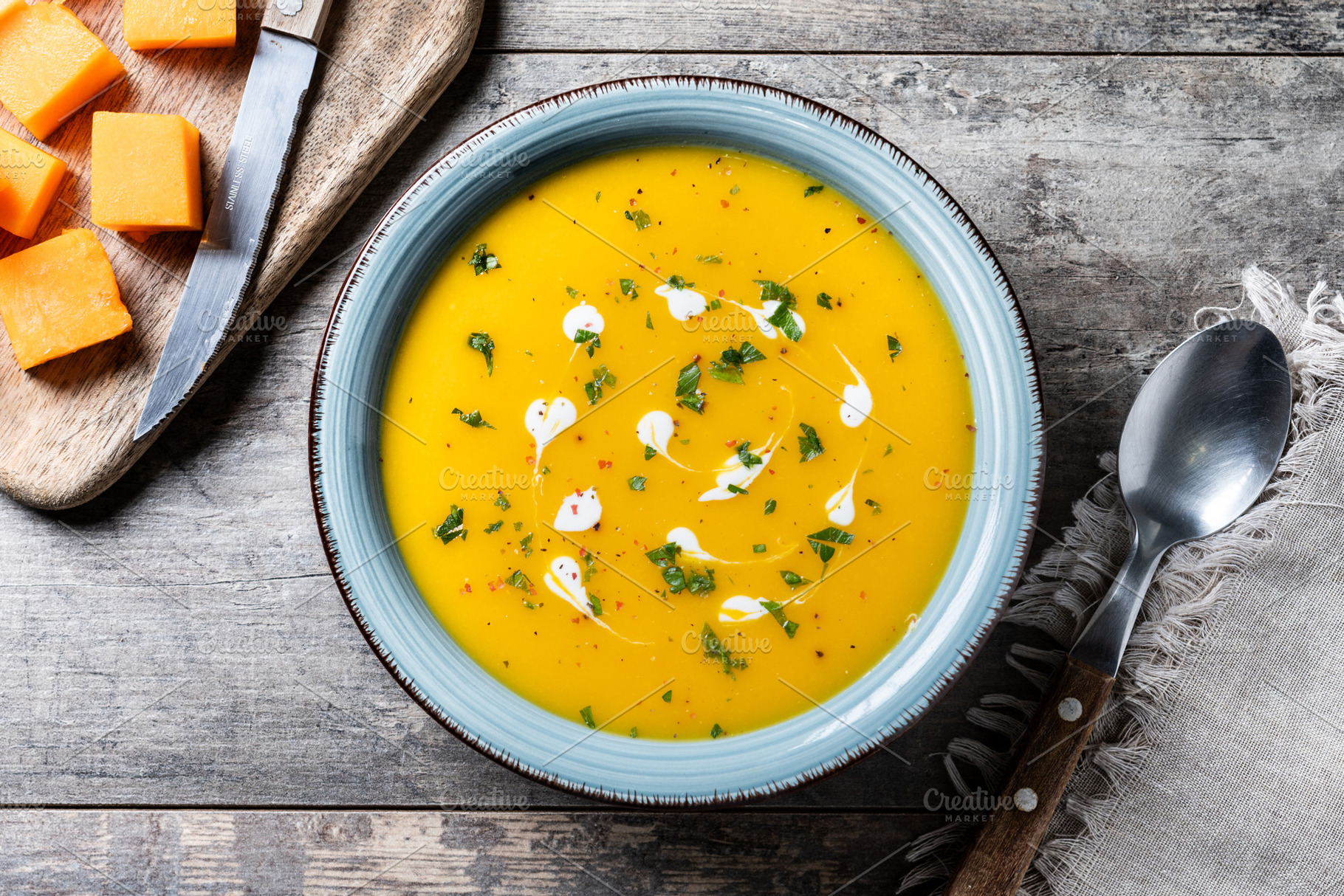 Creamy pumpkin soup with herbs and cream, a Food & Drink Photo by etorres69