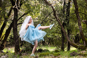 Energetic woman in blue dress and ve, a Person Photo by Imaginarium
