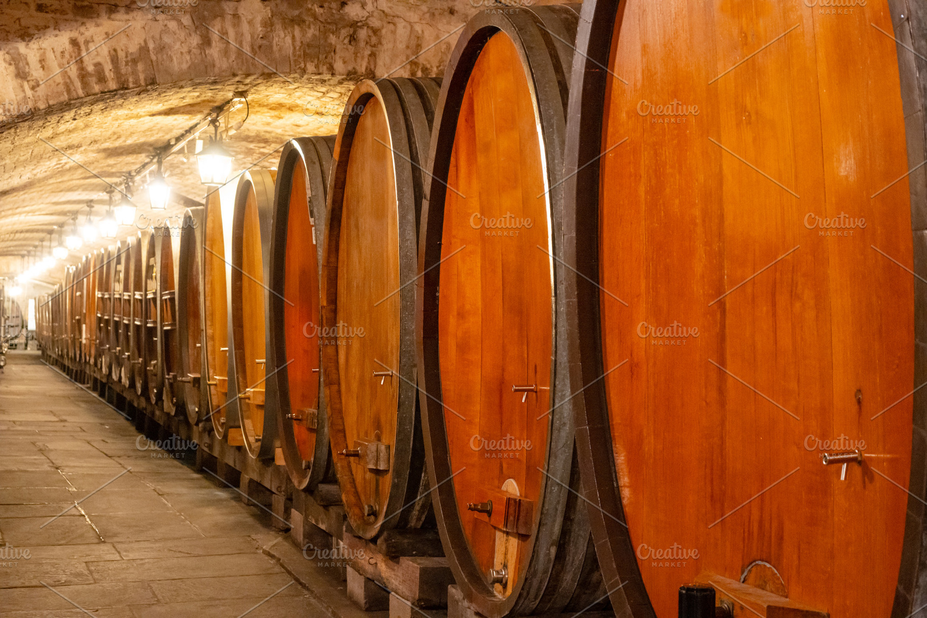 Wine cellar barrels inside historical Strasbourg hospital, a Food & Drink Photo by GoodGoods
