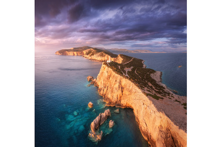 Lighthouse on the mountain peak at, a Nature Photo by den-belitsky