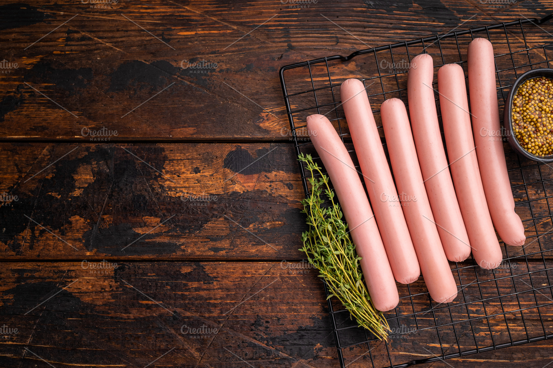Top-down view of uncooked frankfurters ready for the grill, with, a Food & Drink Photo by composter-box@mail.ru