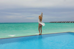 Bungalow in the Maldives, a Person Photo by Photostock