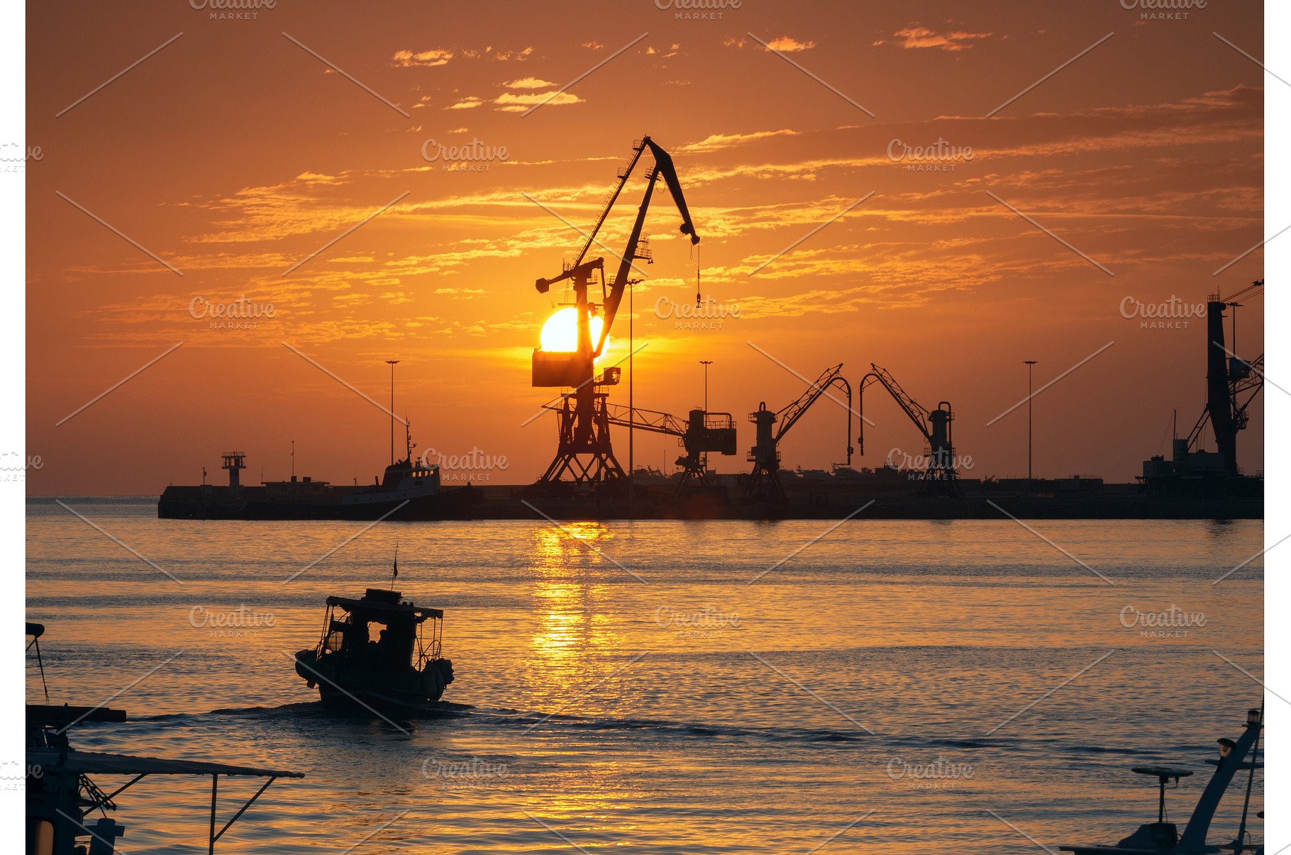 Port of Heraklion at sunrise in, an Industrial Photo by kavalenkava