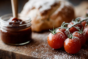 Cherry tomatoes on the vine, sauce, a Food & Drink Photo by MistyDay