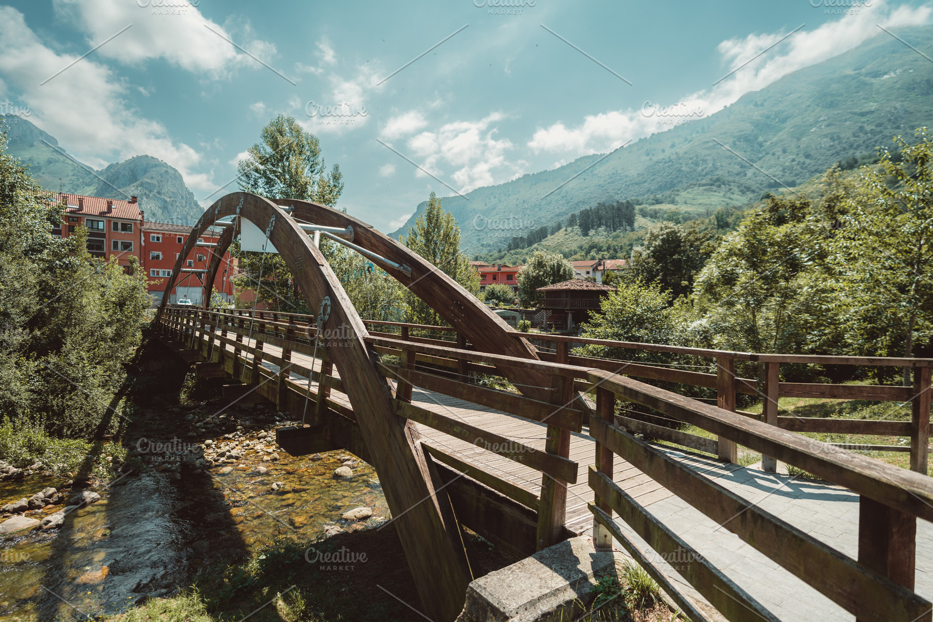 Wooden bridge in mountain village, an Architecture Photo by SkyNext
