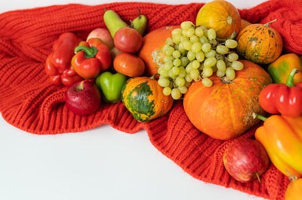 Thanksgiving Day. Big autumn harvest - pear, apples, pumpkin, pepper, tomato on, a Holiday Photo by Artsaba Family