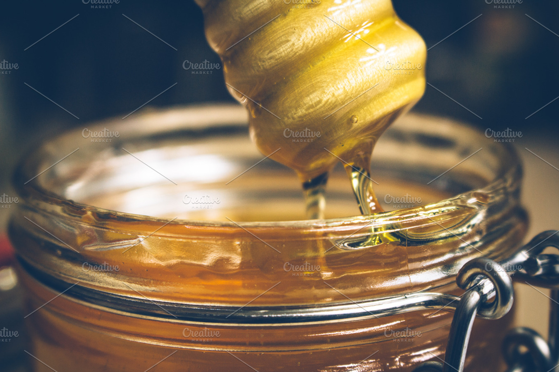 Pouring honey containing honey, food, and dinner, a Food & Drink Photo by Phots.