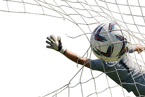 the goalkeeper jumps for the ball, a Sports & Recreation Photo by itakdalee