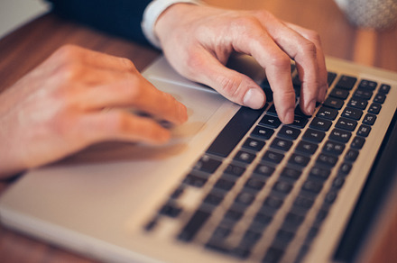 Hands on the keyboard stock photo containing computer and laptop