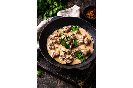 Meatballs in sour cream sauce in a
