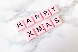 Happy Xmas in Pink Scrabble Letters