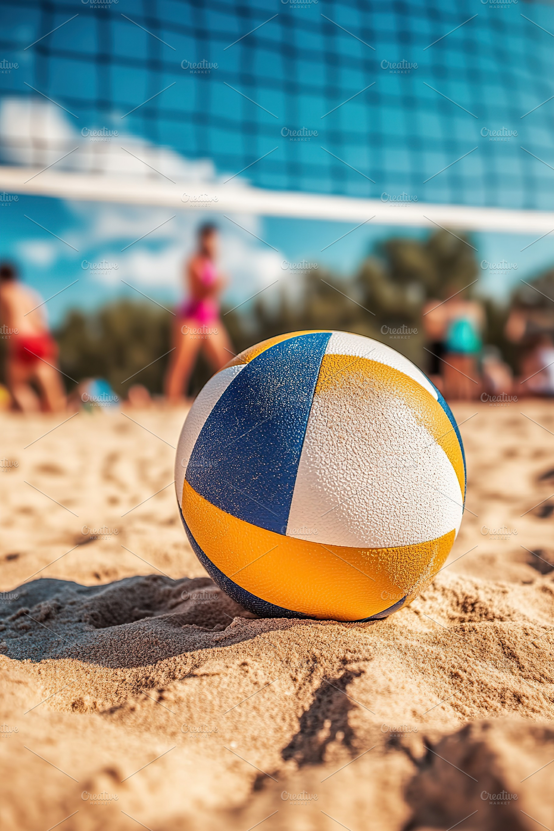 Volleyball rests on sandy beach with players in the background enjoying a sunny, a Sports & Recreation Photo by AlyaAnd