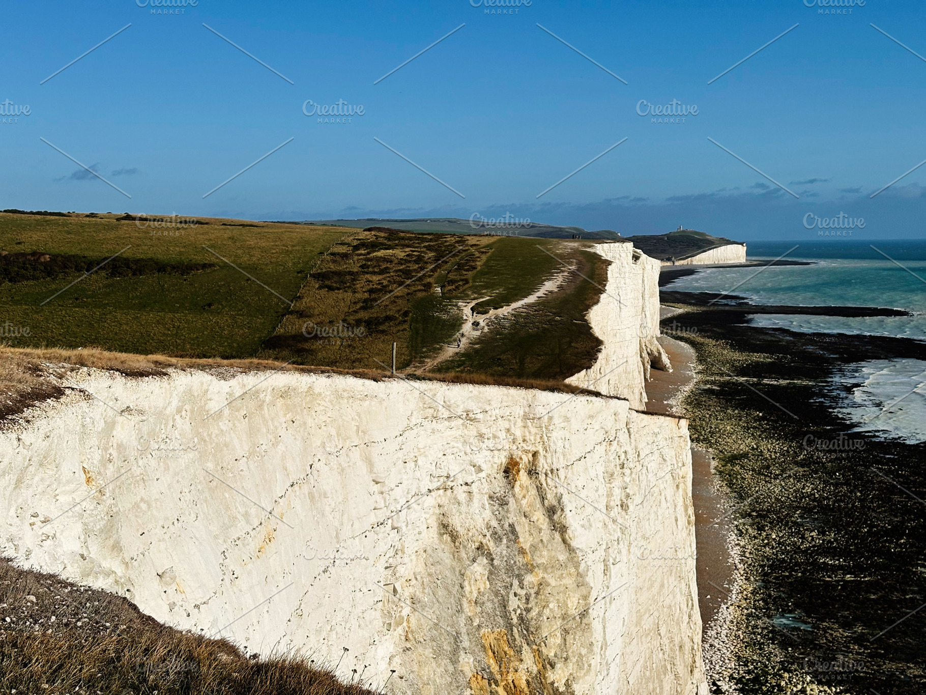 Spectacular white chalk cliffs along Seven Sisters Cliffs coastline in East Sus, a Nature Photo by AS photostudio