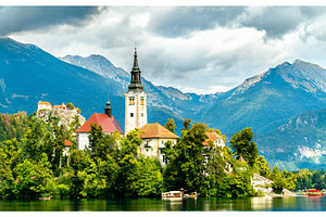 Church of the assumption of mary and containing slovenia, bled, and island, an Architecture Photo by Leonid Andronov