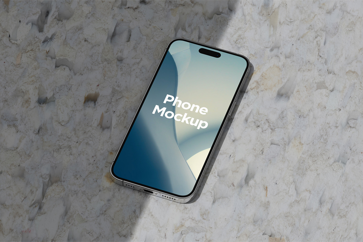4 Lying iPhone 14 Pro Max Mockups, an iPhone Mockup by DreamVisuals (Photo 3 of 4)