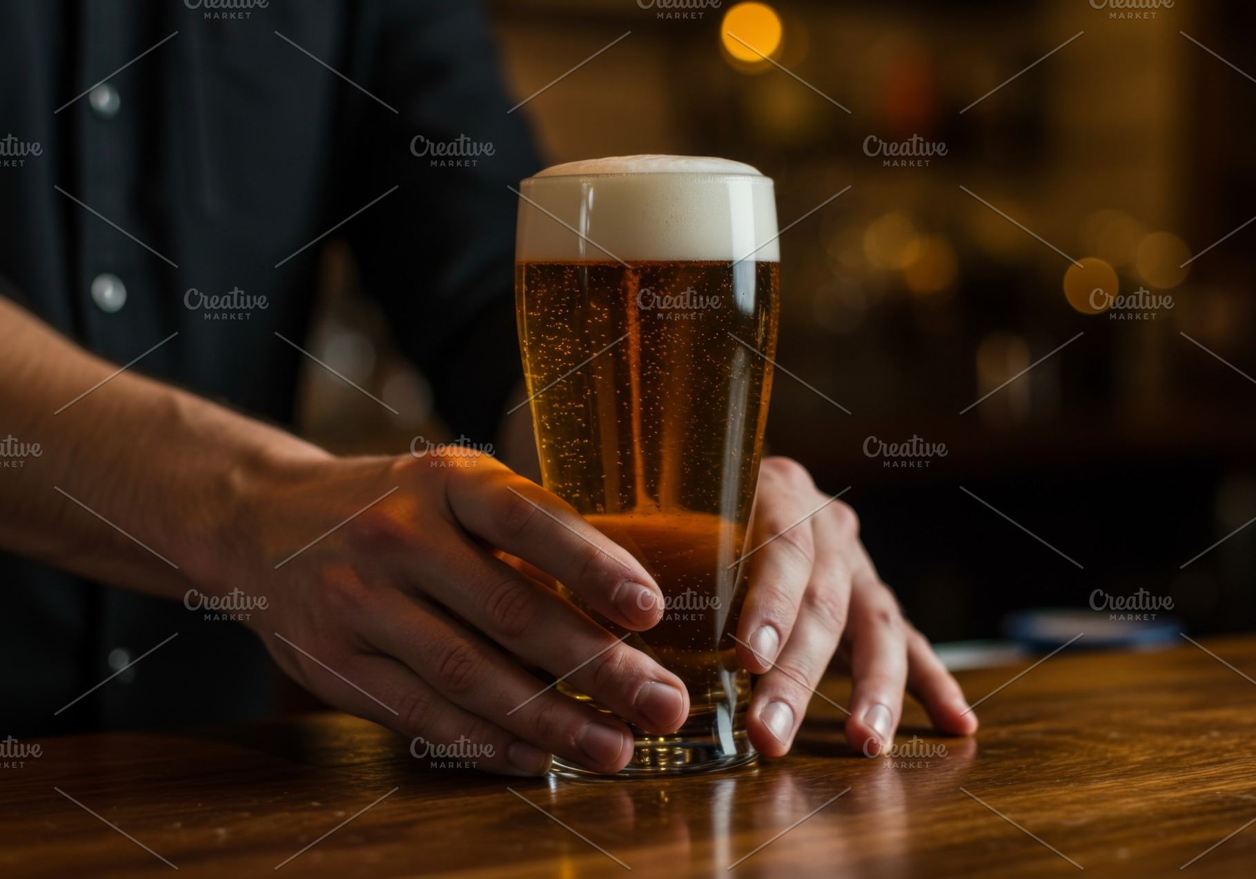 Bartender hand serving a cold pint o, a Food & Drink Photo by professorinc