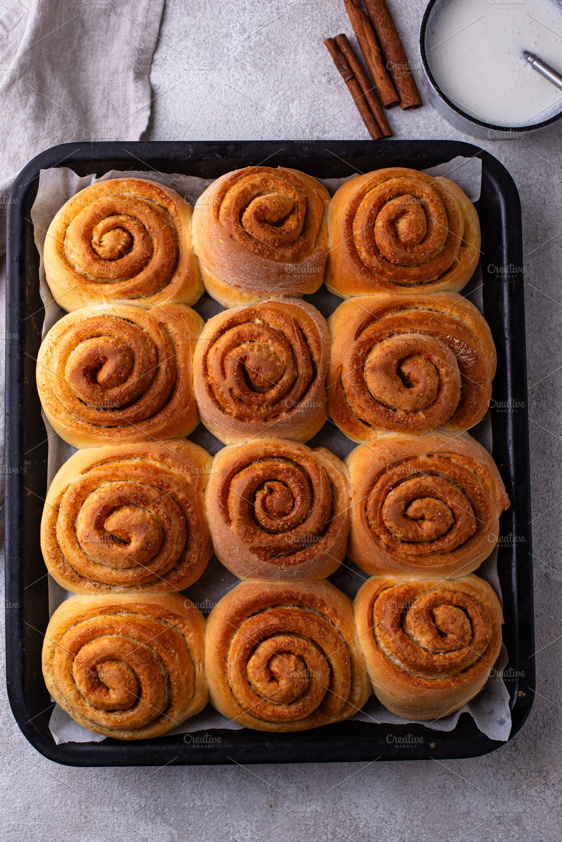 Cinnamon rolls with cream cheese, a Food & Drink Photo by Yulia Furman