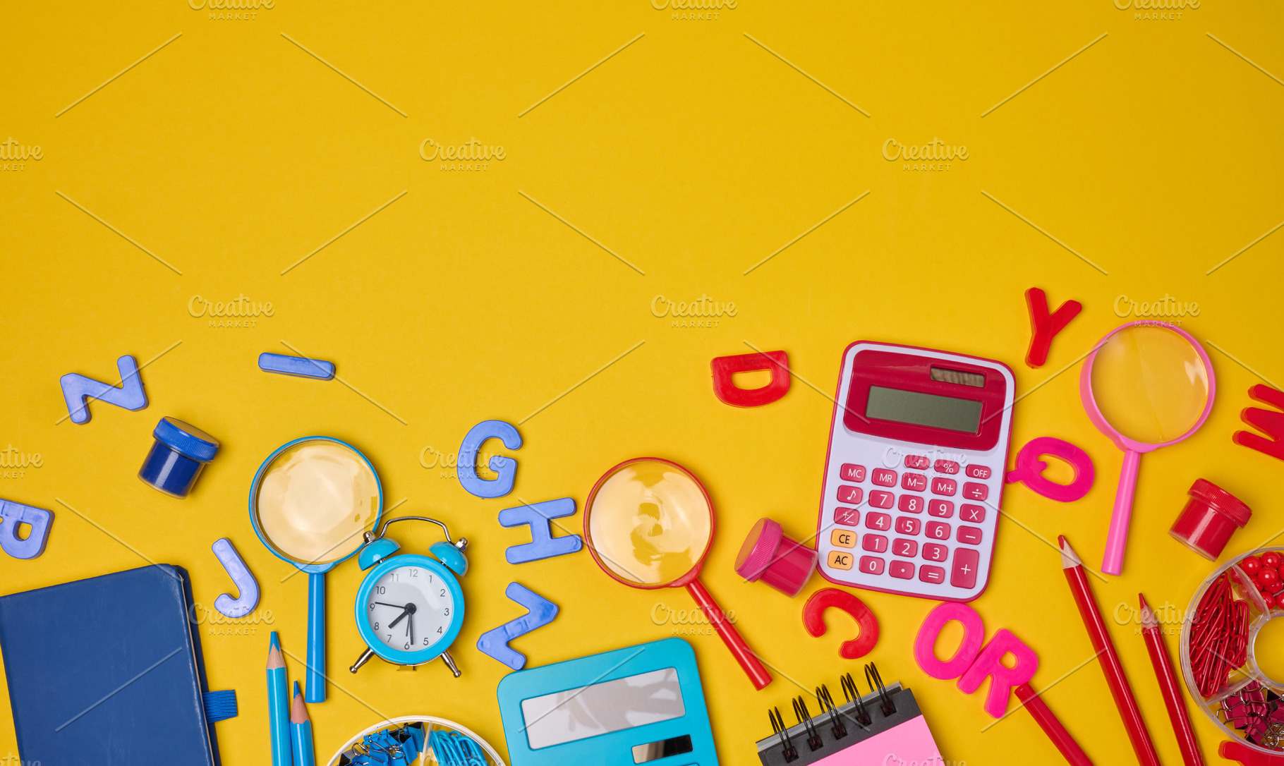 Colorful school supplies, learning items calculators, letters, t, a School & Education Photo by ndanko