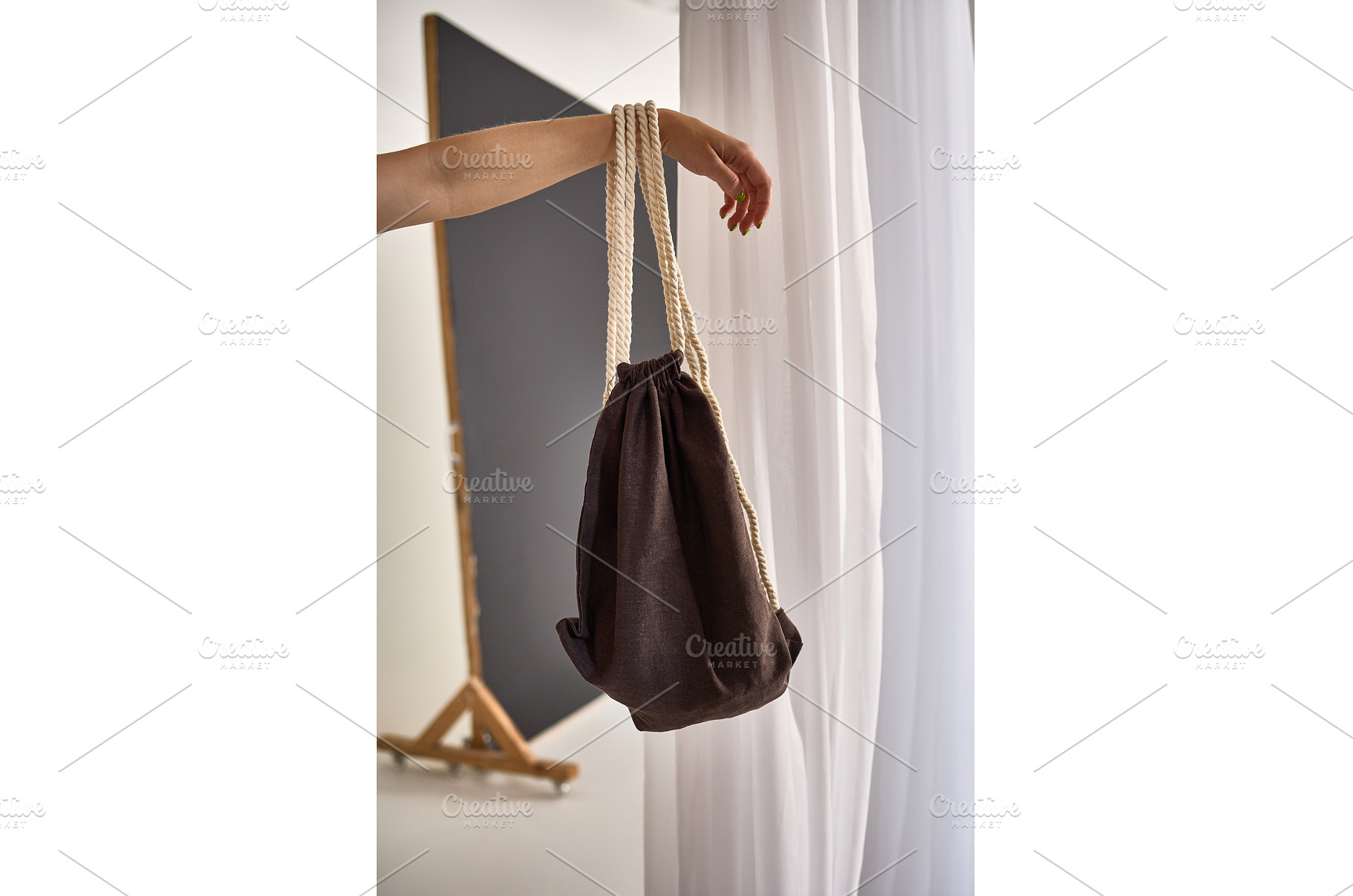 Hand Holding Stylish Drawstring Bag, a Beauty & Fashion Photo by wip3out
