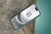iPhone 16 Mockup with Rock – 6 PSD, an iPhone Mockup by Muhazdinata (Thumbnail 6 of 8)