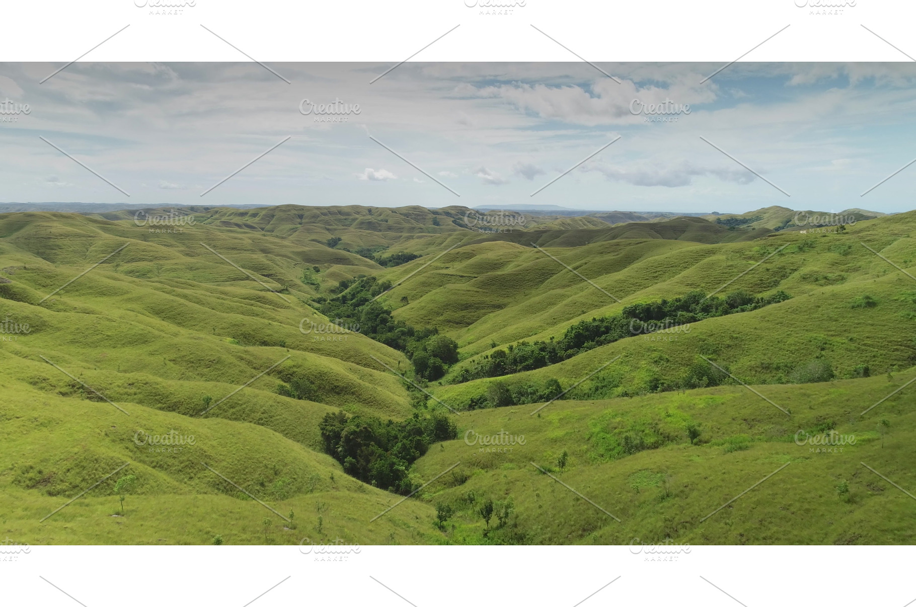 Lush green hills and valleys of, a Nature Photo by Goinyk