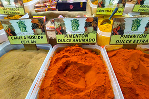 Colorful ground spices on sale at artisan food market, a Food & Drink Photo by DanFLCreativo