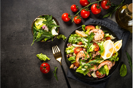 Seafood salad at black table., a Food & Drink Photo by Nadia-nb