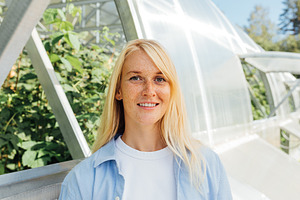 Smiling woman with blond hair, a Person Photo by Artem Varnitsin