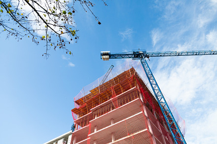 Apartment building under construction in a sunny day