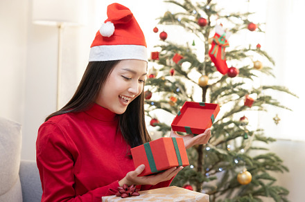 Asian Woman Open Her Christmas Gift