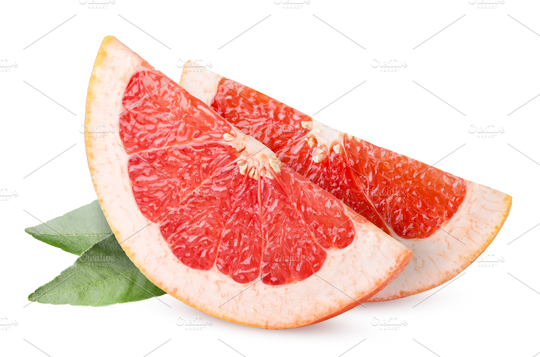 Grapefruit slices and leaves close, a Food & Drink Photo by innakreativ