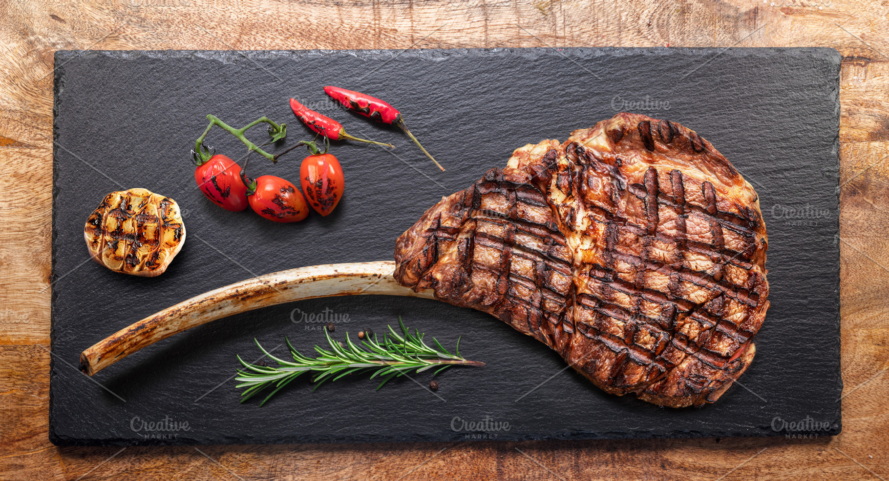 Grilled delicious tomahawk steak, a Food & Drink Photo by Volff