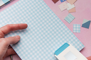 Hand using punch tool creating decorative craft stamps, an Arts & Entertainment Photo by Olena Rudo