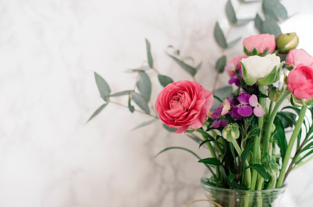 Flowers in vase featuring flowers, vase, and marble